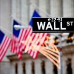 Stocks Settle Lower as Surging Crude Prices Boost Fed Rate Hike Chances